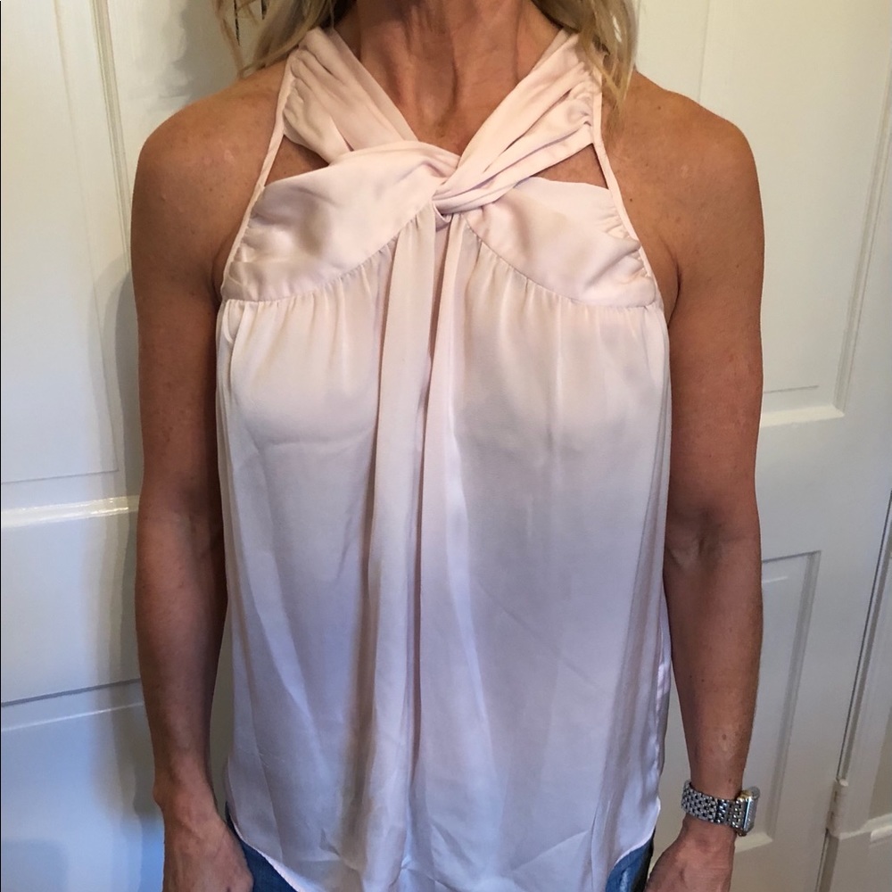 Light pink polyester blouse with twist design